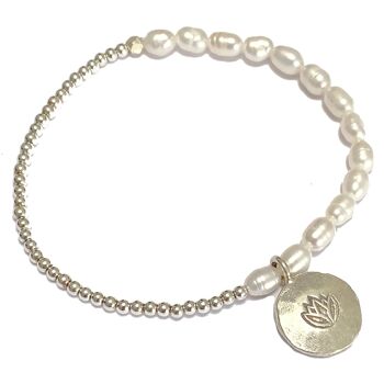 Bracelet en perles d'eau douce et hémitite avec lotus en argent 1