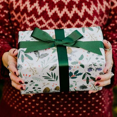 Papel de regalo navideño con follaje festivo - Marfil