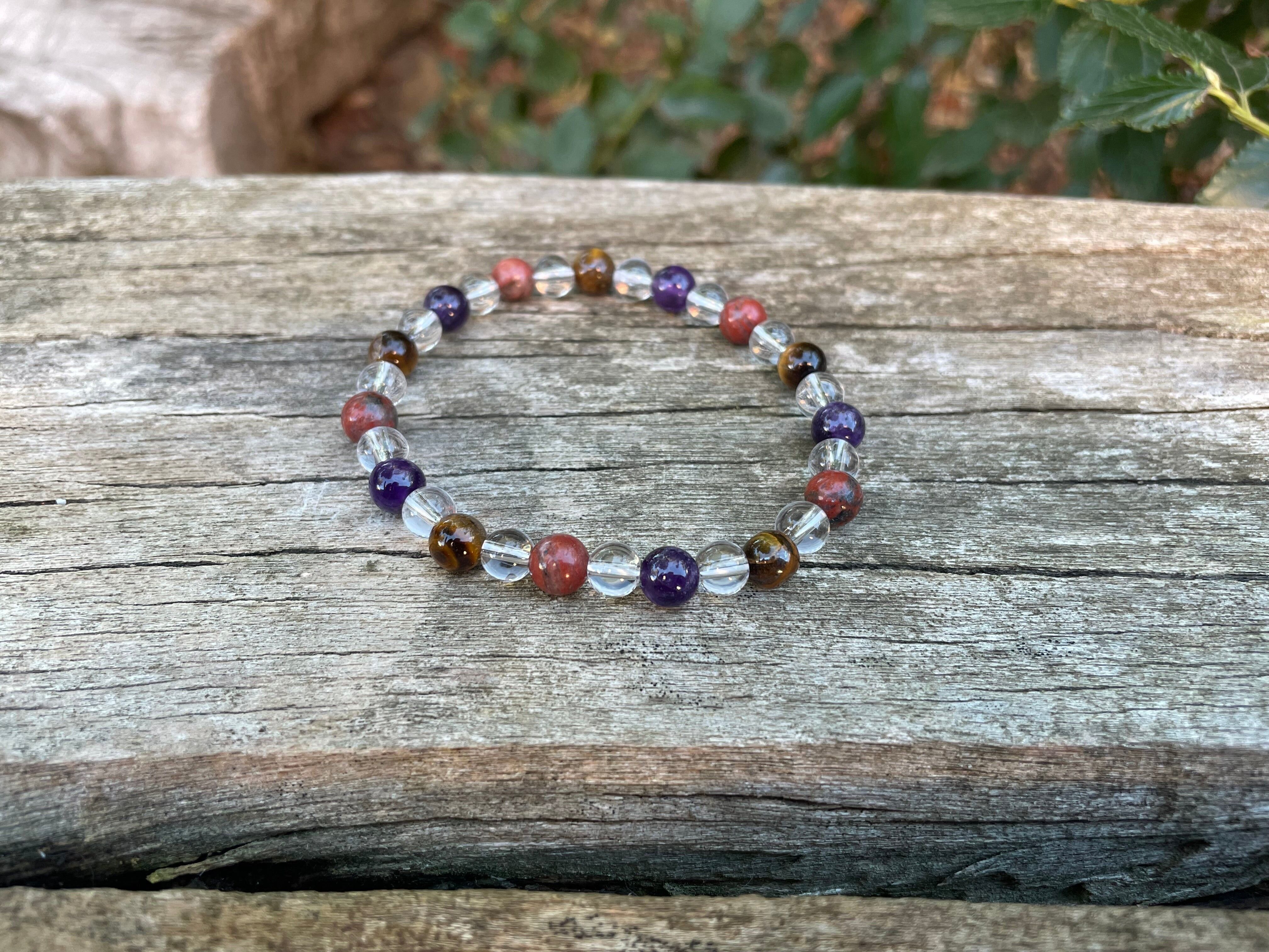 Bracciale elastico per litoterapia, protezione in Occhio di Tigre, Diaspro Rosso, Ametista e Cristallo di Rocca