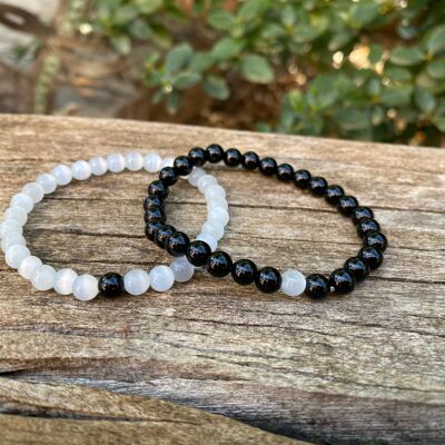 Elastic distance and couple bracelets in Moonstone and Onyx -