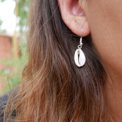 Dangling cowrie shell earrings