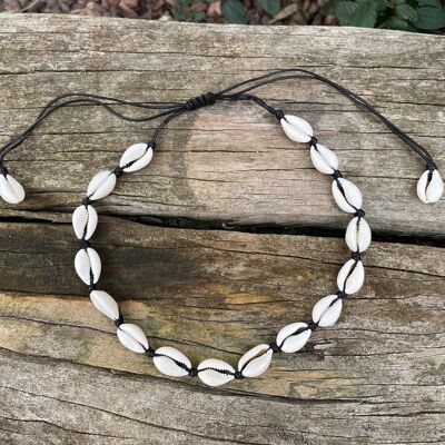 Black necklace in natural beige cowrie shells