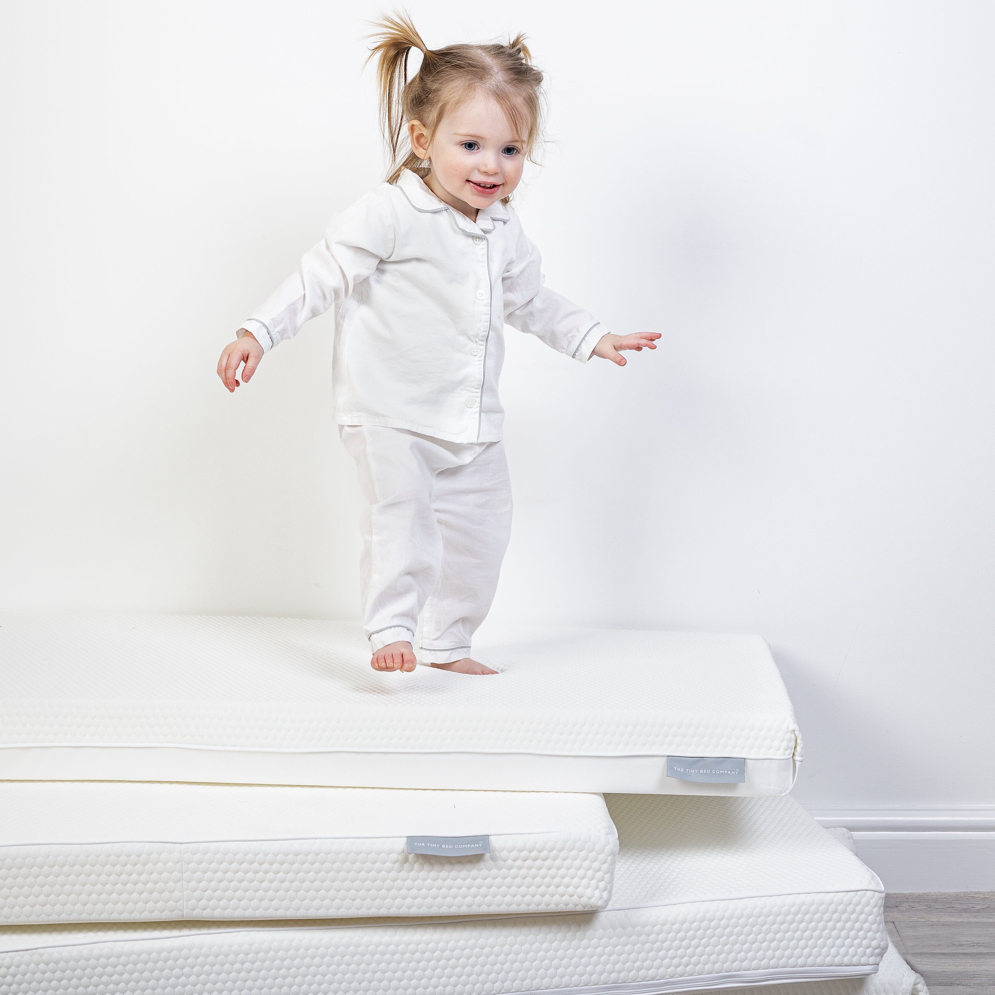 Travel cot hotsell mattress size