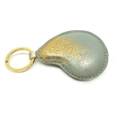 Key ring, bag charm in almond green leather