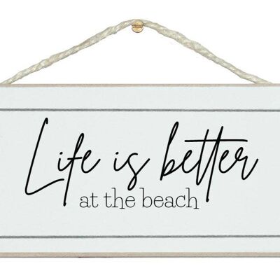 La vie est meilleure à la plage. Signes de la maison