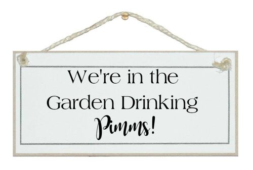 In the garden drinking Pimms Drink Signs