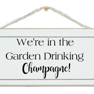 In the garden drinking Champagne Drink Signs