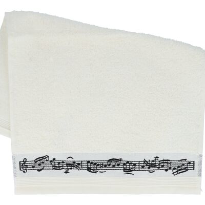 cream-colored guest towel with border of notes