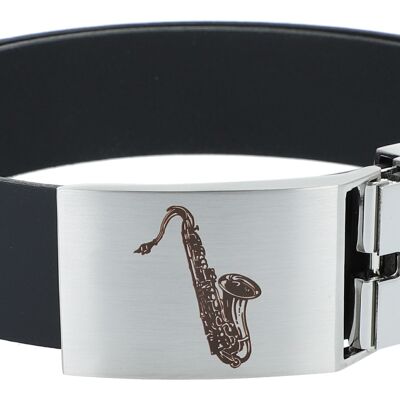 Leather belt with metal buckle, musical motif saxophone
