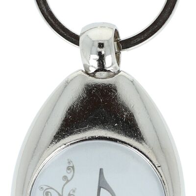 Key ring with a musical motif and a shopping chip