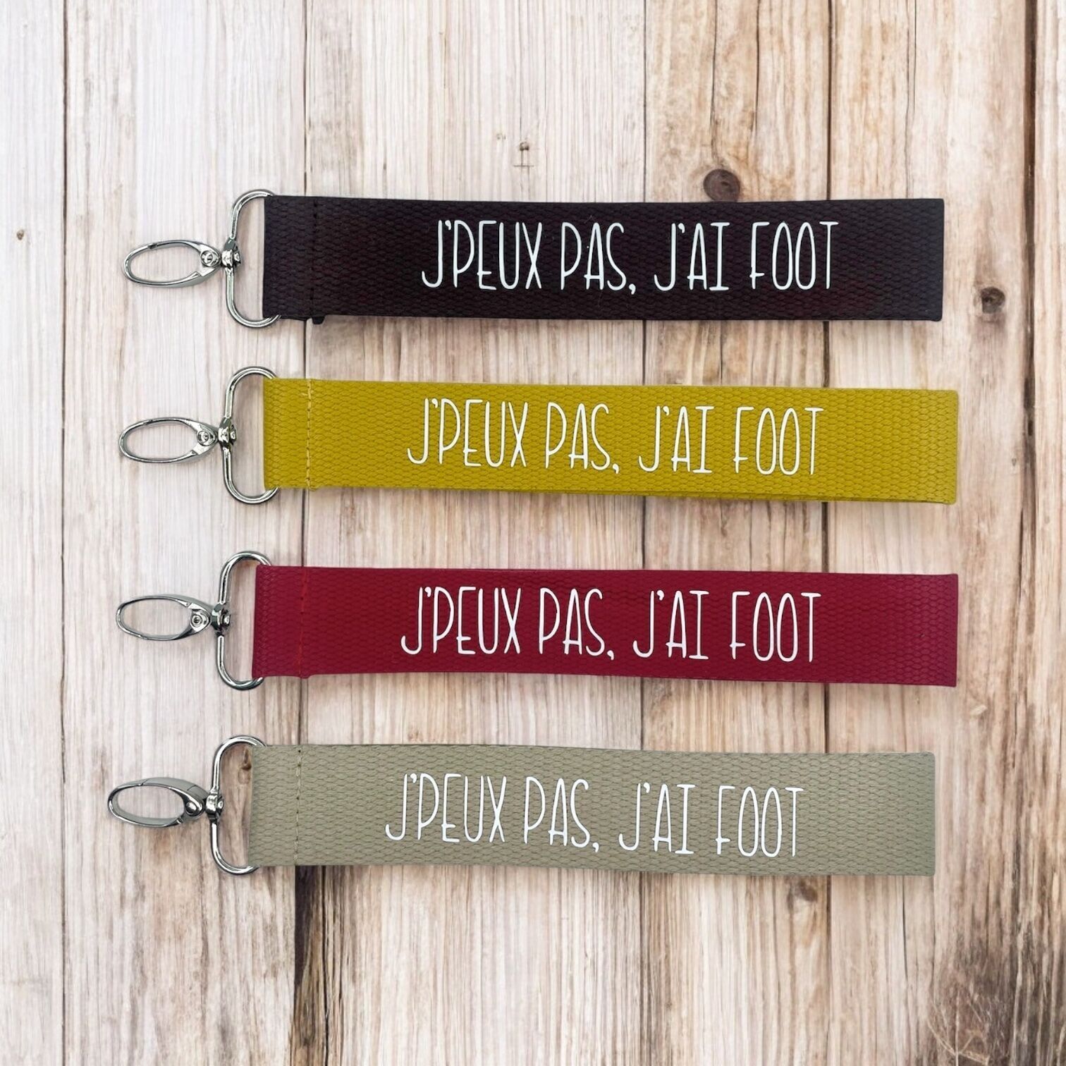 Schlüsselanhänger mit der Aufschrift: „Ich kann nicht, ich habe Fußball.“