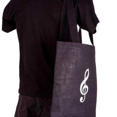 bolso de mano negro con clave de sol blanca