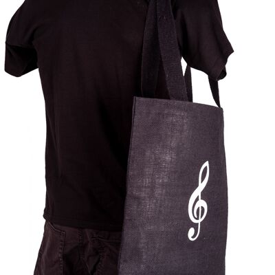 black handle bag with white treble clef