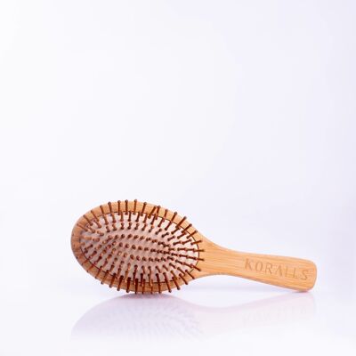 Cheveux raides, la brosse à cheveux en bambou