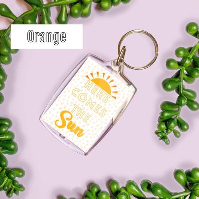 Here comes the sun positivity keyring Grey