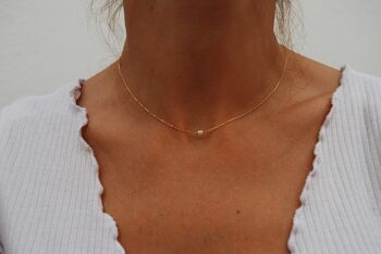 Collier en or 18 carats avec perles. 4