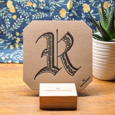 Letterpress card letter R (2nd version), vintage alphabet, thick kraft recycled paper, octagon, relief, black