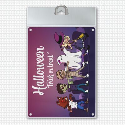 Metal sign with Halloween motif, saying and little monsters