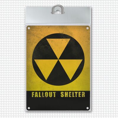 Metal sign with Fallout Shelter nuclear bunker motif
