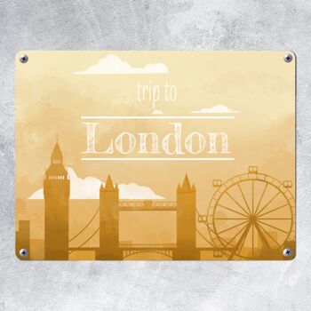 Panneau en métal pour les fans de city trips avec la silhouette de Londres en jaune 2