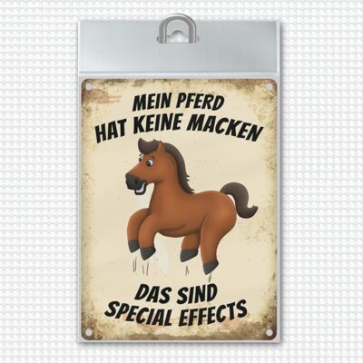 Metal sign with horse motif and saying: My horse has no quirks, that
