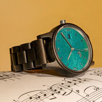 Opis UR-U1: The classic unisex retro wooden wristwatch made of black sandalwood with a unique, embossed turquoise dial with silver metal components