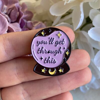 Crystal ball mental health pin badge.