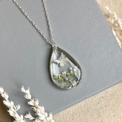 The Dew Drop real flower & white butterfly silver necklace.