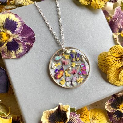 Real flower & butterfly Encanto inspired silver necklace.