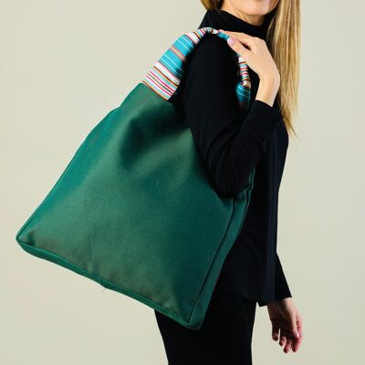 Green oversize tote bag with striped handles