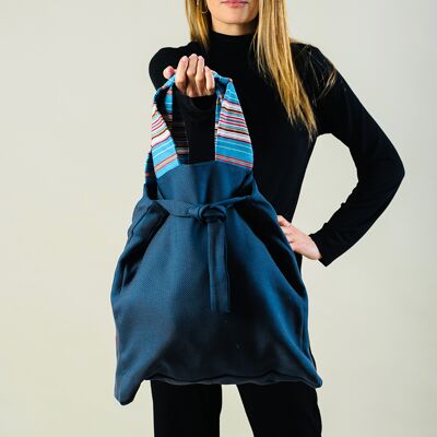 Blue oversize tote bag with striped handles