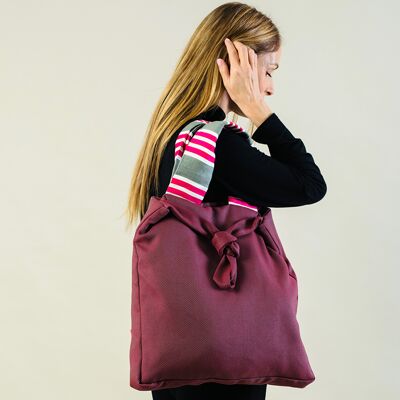 Red oversize tote bag with striped handles