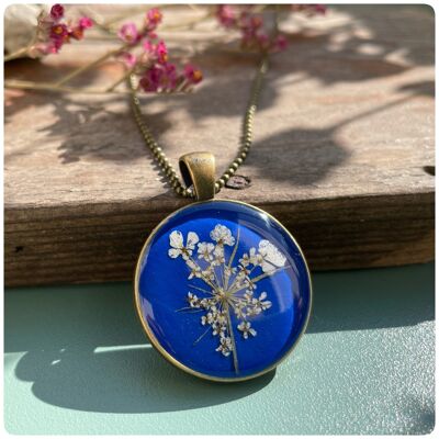 Necklace with real wild carrot flowers in dark blue