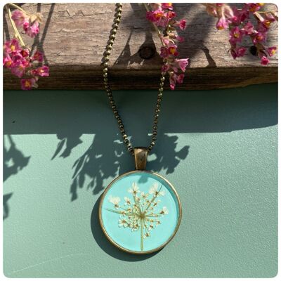 Necklace with real wild carrot flowers in light blue