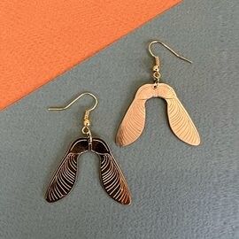 Helicopter seed golden earrings