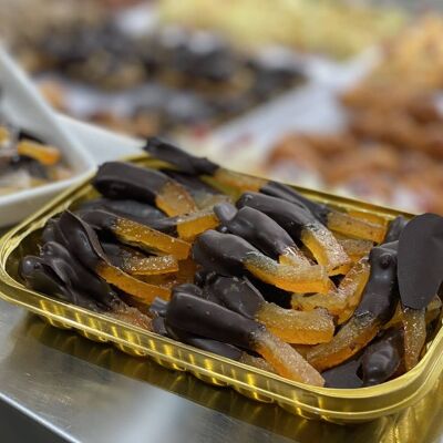Candied orange peels covered with dark_medium chocolate