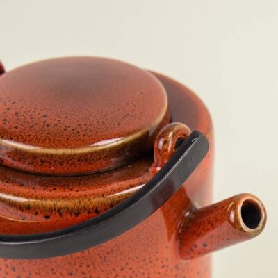 Laterite teapot by Hoa Bien with black brass handle