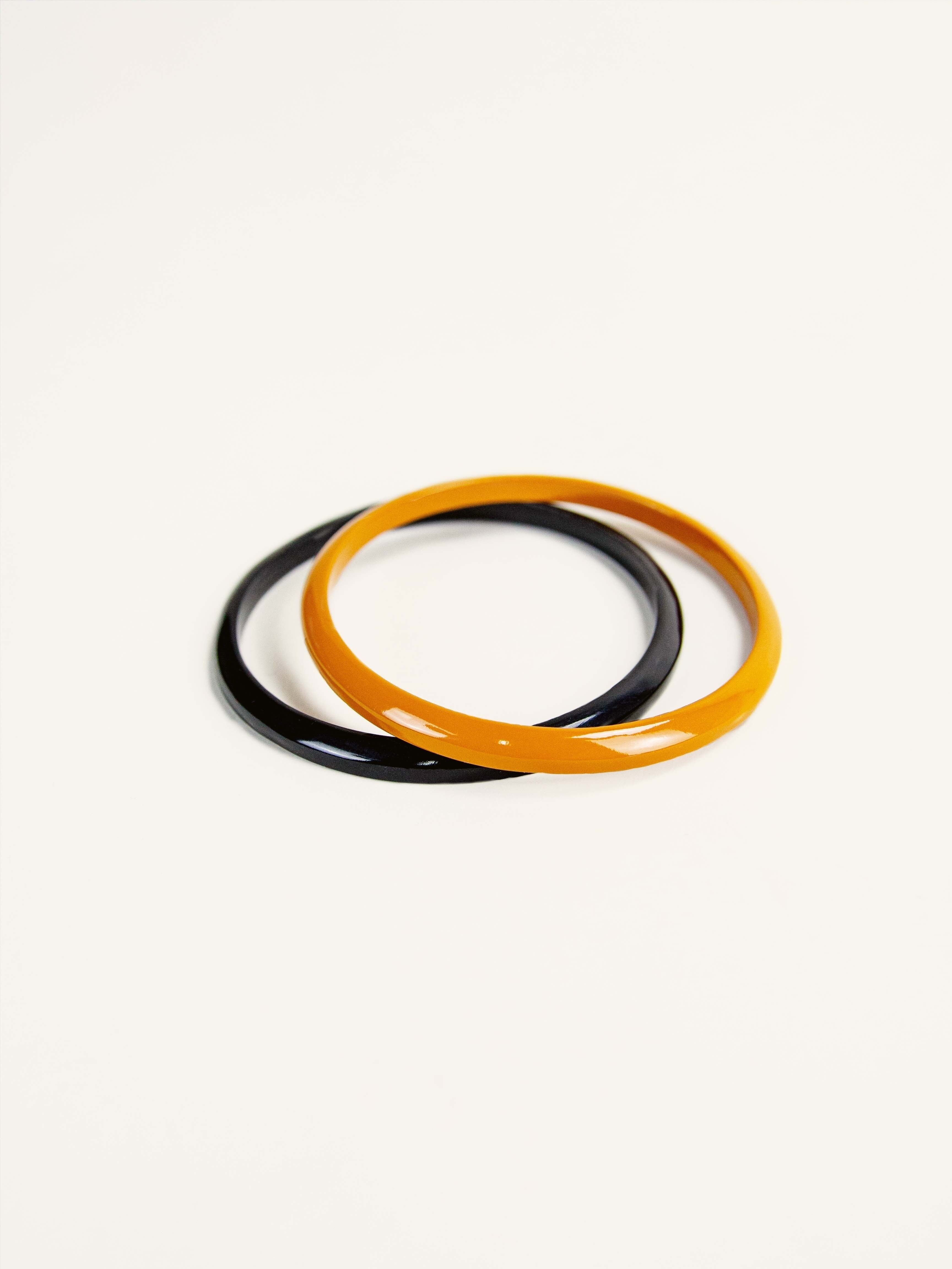 Set of 2 Tu Vi round bracelets in black horn and orange lacquer size M