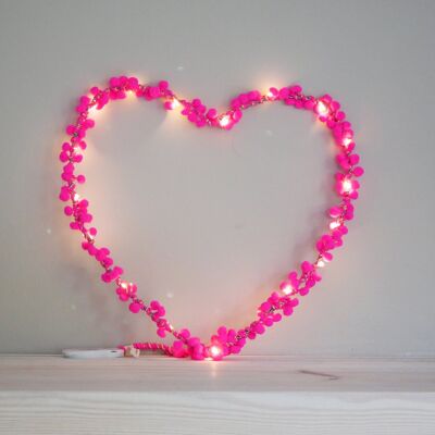 Luce a forma di cuore con pom pom