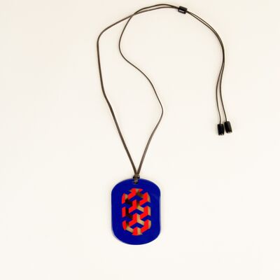 Oval pendant with Tresse motifs with indigo and orange lacquer