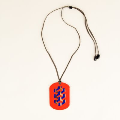 Oval pendant with Tresse motifs with orange and indigo lacquer