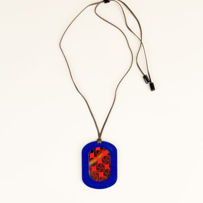 Pendentif oval aux motifs géométriques avec laque indigo et orange