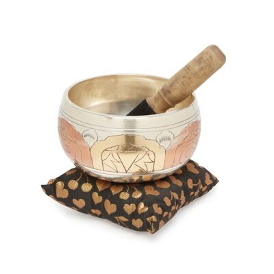 Copper singing bowl decorated with an embossed Buddha