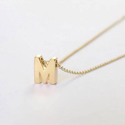 Initial capital letter necklace in matte gold