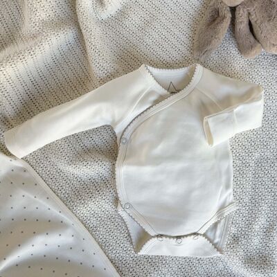 Organic baby bodysuit with gray trim