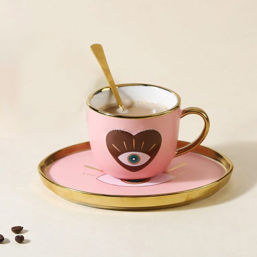 Keramiktasse „EYE“ rosa mit Untertasse und Löffel. TK-326