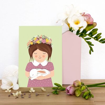 Cartolina di primavera - ragazza con coniglietto