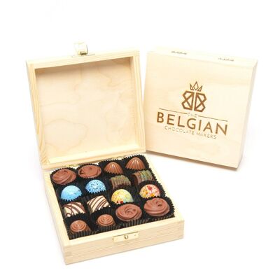 16 belgian pralines in an engraved wooden box 240 Grs