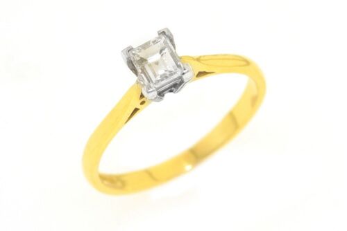 18ct yellow and white gold ring with .50 carat diamond.