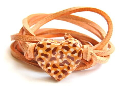 Natural leather cord with tiger print ceramic heart.